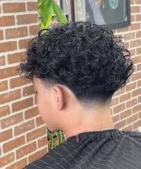 The 36 Best Curly Hairstyles for Men image